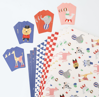Circus gift wrapping paper set featuring animal icons and blue diamond check