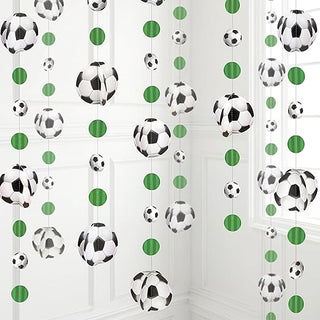 Soccer ball and green circle hanging garland decorations in a repeating layout