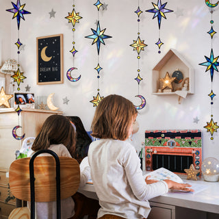 Star and moon hanging garland with iridescent plastic charms and dangling strings