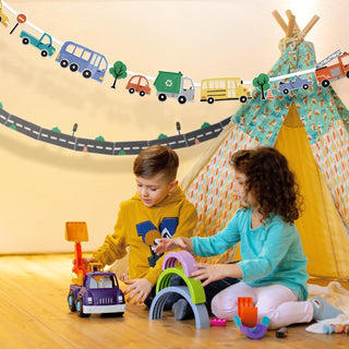 Curved road transport banner with buses, trucks, cars, and trees over a play tent