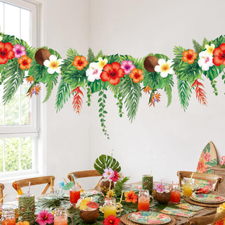 Tropical flower banner garland with multicolor blooms, green leaves, and hanging vine accents