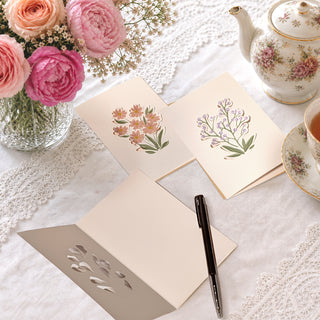 Wildflower greeting card set with envelopes on lace, floral illustrations and teapot decor