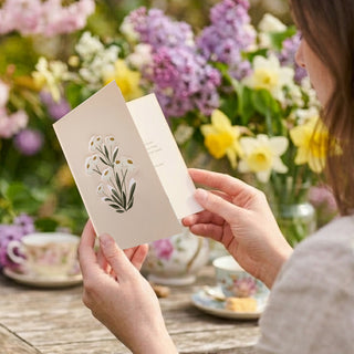 Wildflower greeting card with envelope, beige card featuring a botanical sprig illustration