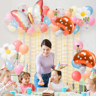 Balloon and garland kit with fairy balloons, mushroom balloon, and flower garland strips