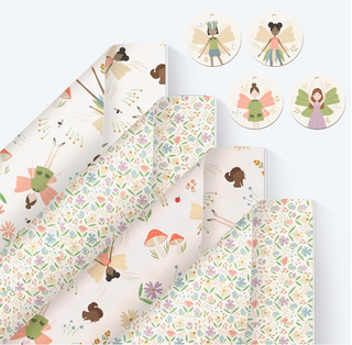 Fairy-themed gift wrap set with patterned sheets and round hanging gift tags