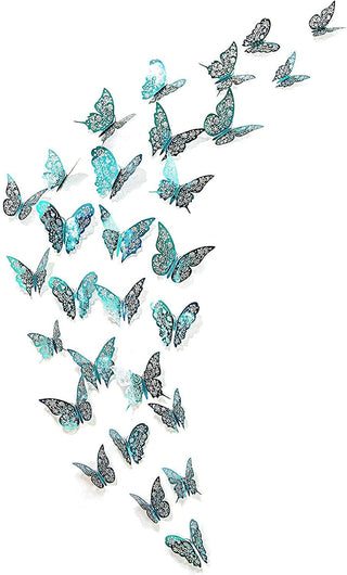 Teal blue butterfly wall stickers scattered on a white sheet, ornate patterns