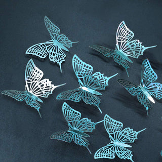 Close-up teal blue 3D butterfly wall stickers on a dark surface