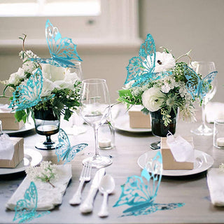 3D Teal blue butterfly wall stickers for birthday decorations on a dining table