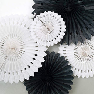 Set of black and white circular paper rosettes with layered fan edges