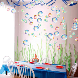 Rainbow bubble wall decal stickers scattered on a wall with iridescent large and small circles
