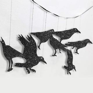 Black glitter crow banner garland with several hanging crow silhouettes