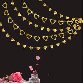 Gold glitter heart garland with metallic hearts on a long hanging string