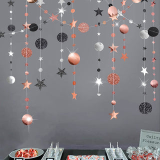 Hanging glitter star and circle dot garland with rose gold and black ornaments