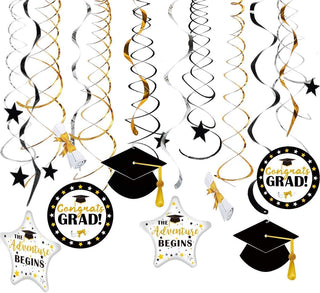 Gold and black graduation hanging swirls for graduation party decorations, featuring paper Congrats Grad medallions, stars, and caps