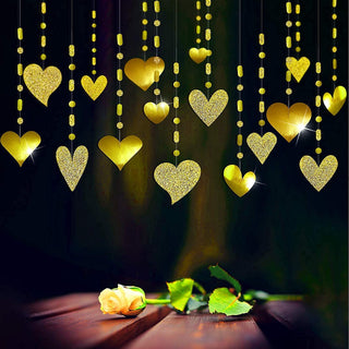Gold glitter heart hanging garland streamers with multiple glitter hearts and dotted loops for golden valentines