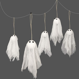 Set of hanging ghost decorations with white tulle sheets and black eyes on strings