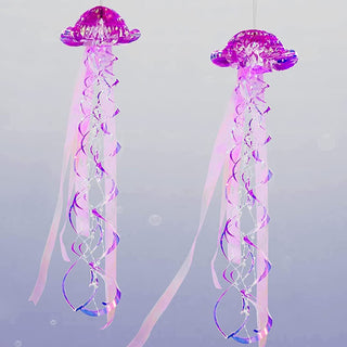 Pair of hanging iridescent purple jellyfish decorations with long ribbon tentacles