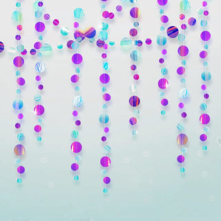 Iridescent blue and purple hanging garland strands with round foil pieces