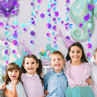 Iridescent blue and purple hanging garland strands with round and oval foil pieces