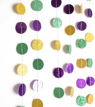 Mardi Gras bead garlands with glittery purple, green, and gold round hanging decorations
