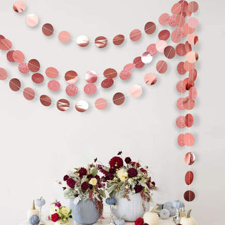 Rose gold circle dot garland kit with layered round paper discs, curved strand