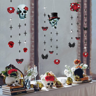 Halloween rose skull garland with hanging blue skull heads, red roses, black bats, butterfly accents