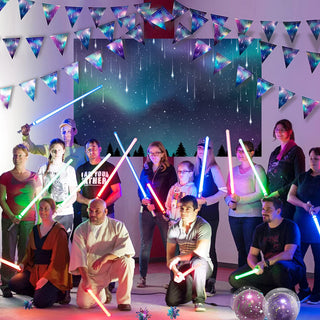 Galaxy triangle bunting banner with purple-blue star print flags strung above a party scene.