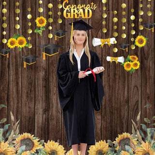Graduation banner with black cap topper, sunflower decorations, and Congrats Grad headline
