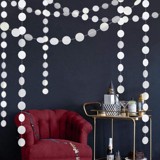 Pearl white circle dot garland with round discs on strings, draped decorative strands