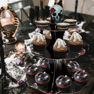 3-tier cupcake stand with skull topper and red rose, displaying cupcakes on each tier
